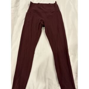 Athletes Transcend Stash Tight Legging size small in burgundy